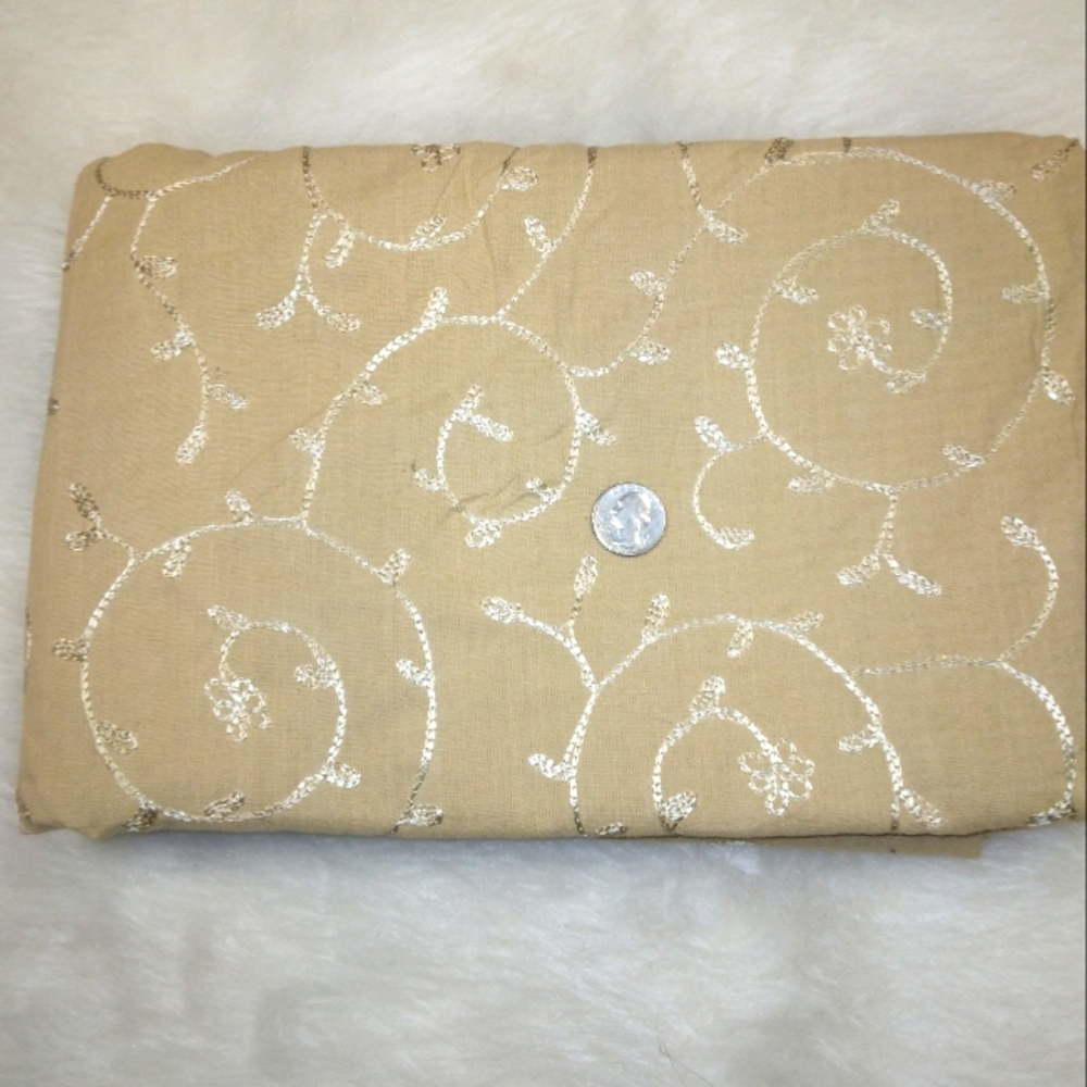 FABRIC Whimsical scrolling embroidery of woven cotton, tone on tone beig…